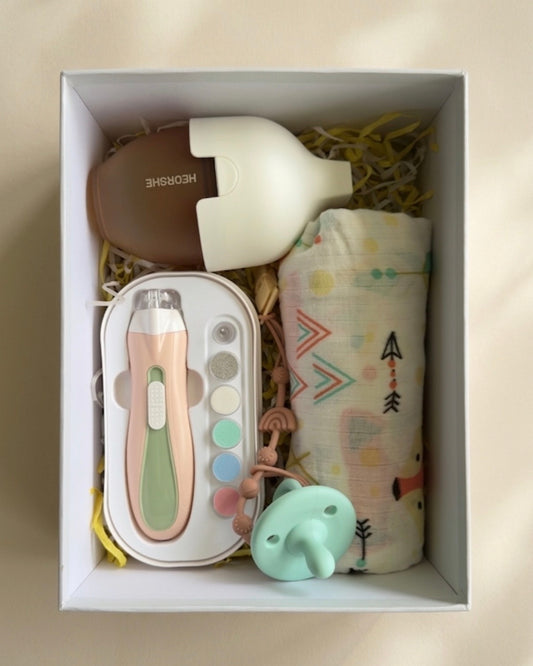 Newborn Essentials Bundle - 5-Piece Baby Starter Gift Set (Bottle, Nail trimmer, Swaddle, Pacifier & Clip)